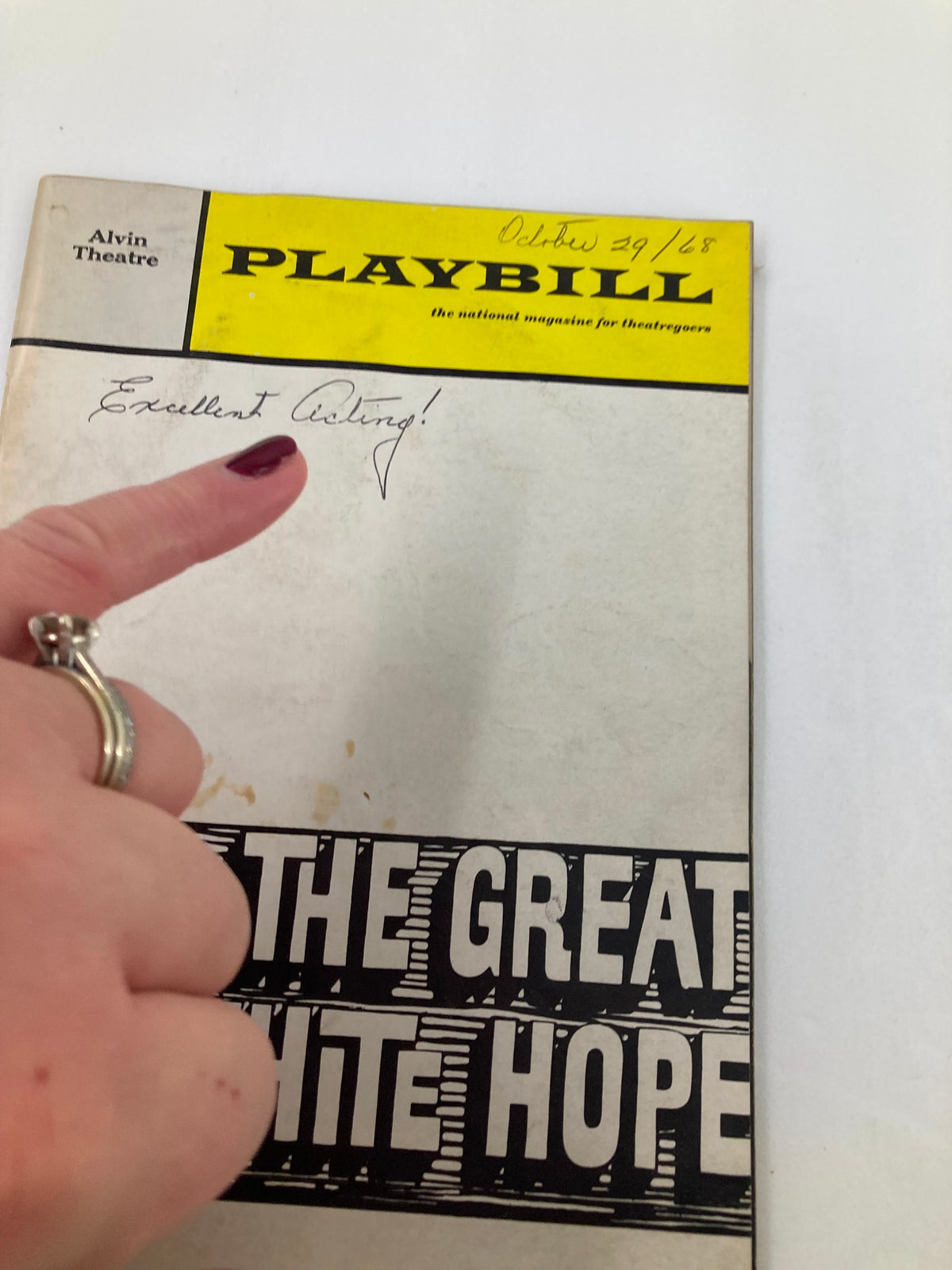 Close-up of the front cover of the 1968 Playbill for The Great White Hope at Alvin Theatre, showing a hand pointing to the note 'Excellent Acting!' and the date October 29, 1968.