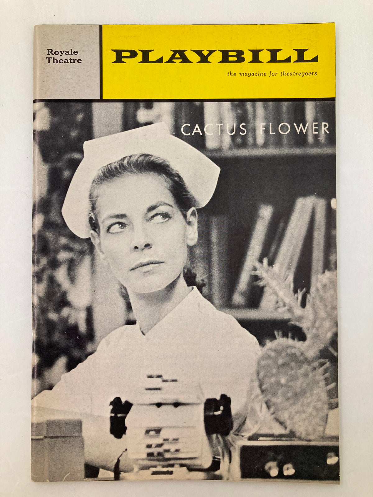 1966 Playbill Royale Theatre featuring a nurse from the production Cactus Flower with black and white photography.