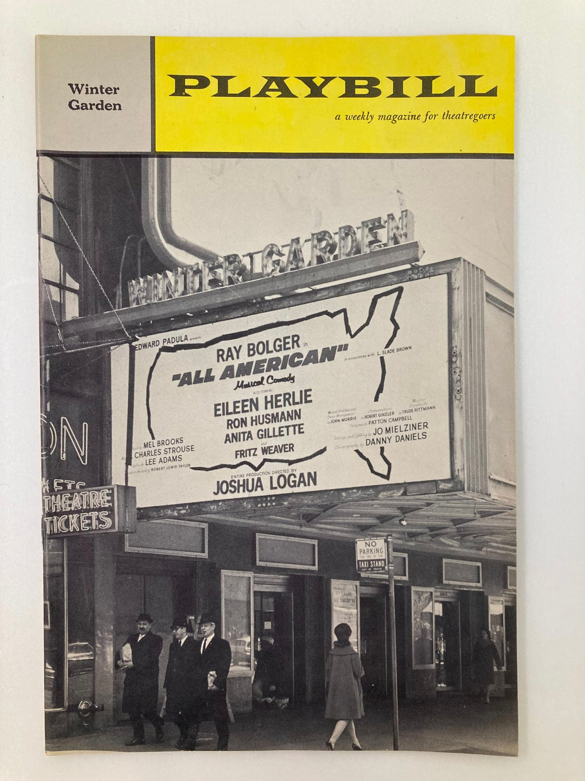 1962 Playbill for Winter Garden Theatre featuring Ray Bolger and Eileen Herlie in 'All American', depicting the theater marquee with cast names and vintage storefronts.