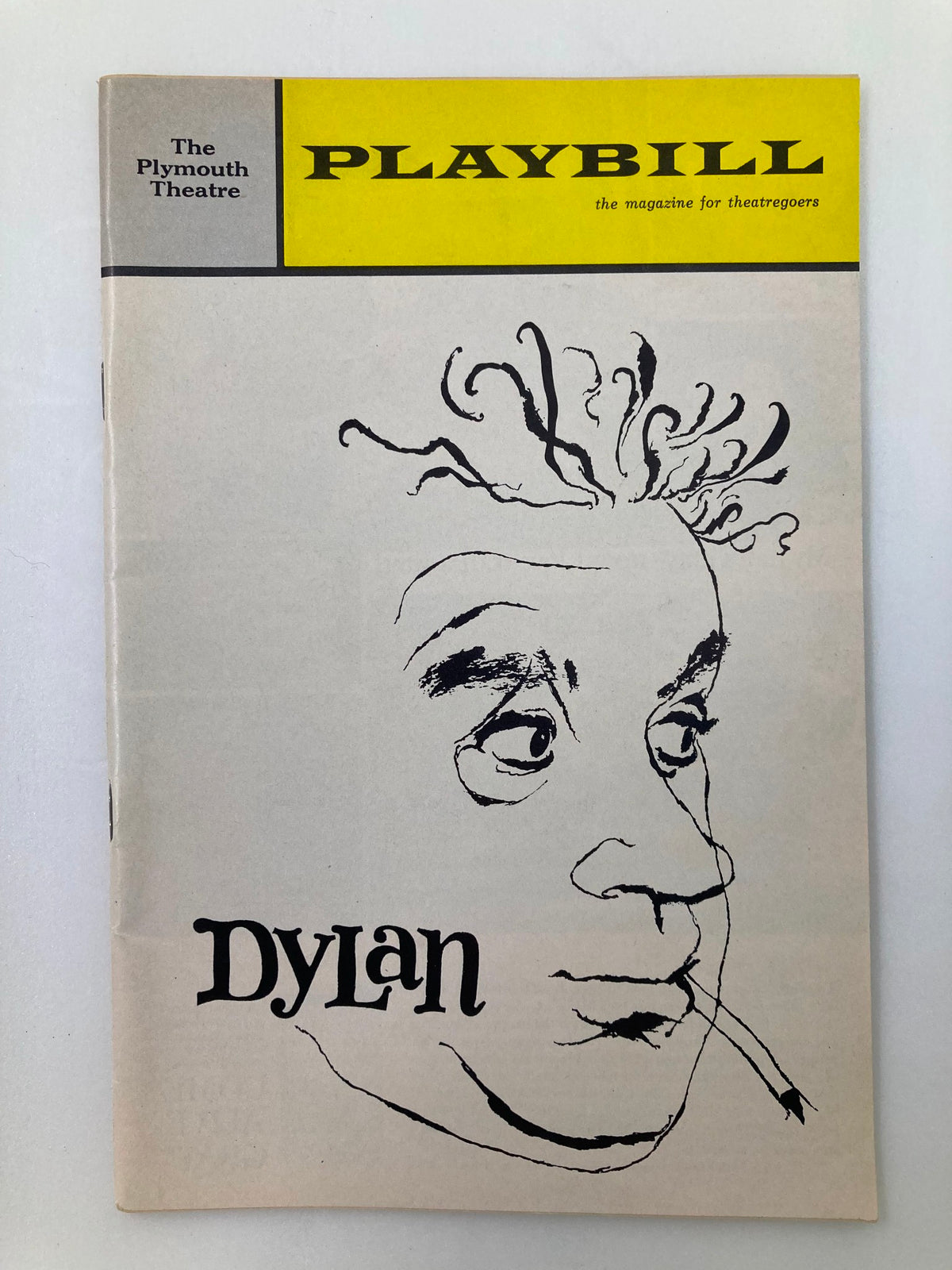 1964 Playbill The Plymouth Theatre featuring Alec Guinness and Kate Reid in Dylan, showcasing a unique artistic illustration of a character from the play.