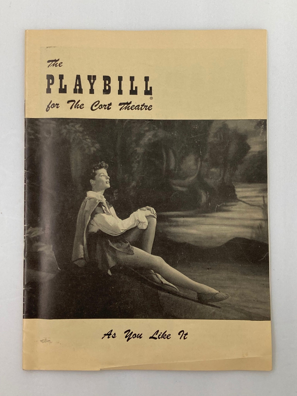 1950 Playbill for The Cort Theatre featuring the title 'As You Like It' with a vintage image of a performer seated in a scenic outdoor setting.
