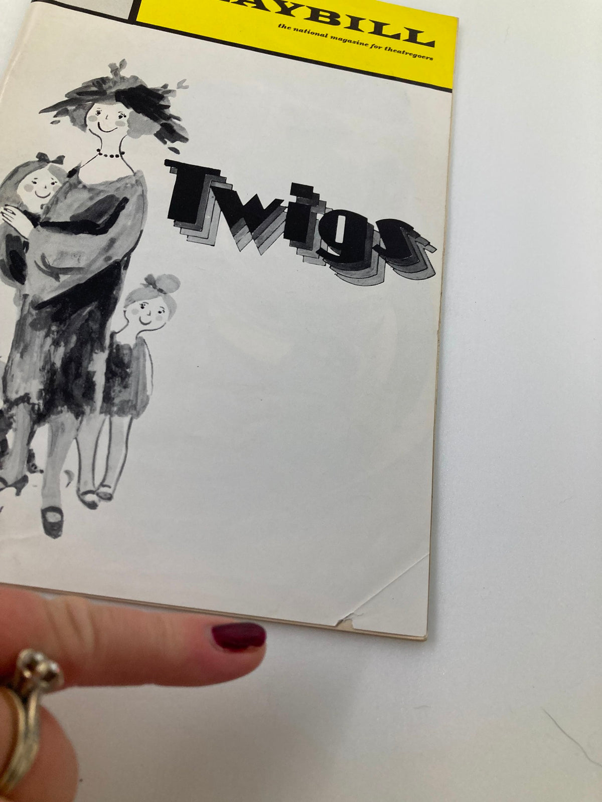 Close-up of the 1972 Playbill The Plymouth Theatre highlighting the title 'Twigs' with a finger pointing at the cover.
