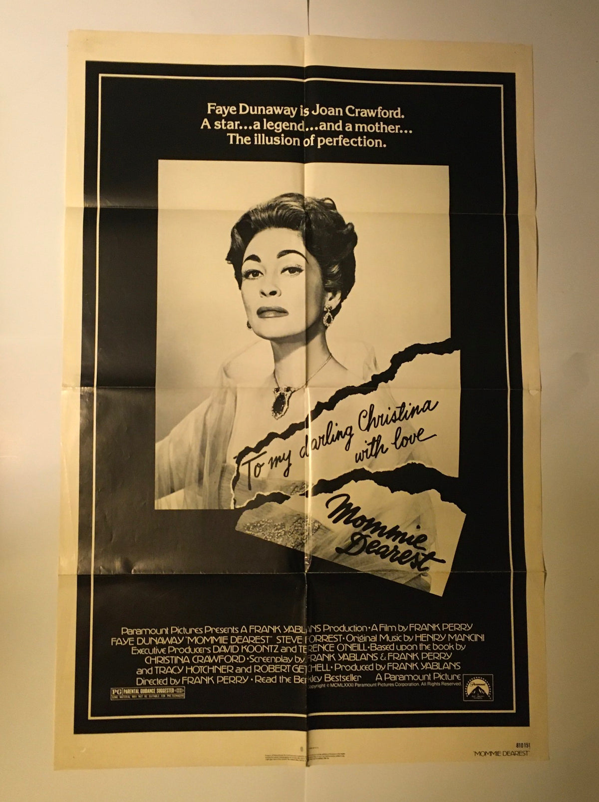 1981 Mommie Dearest 41" x 27" Original Movie Poster featuring Faye Dunaway, depicting her iconic portrayal of Joan Crawford with elegant styling and memorable quotes, representing vintage Hollywood memorabilia.