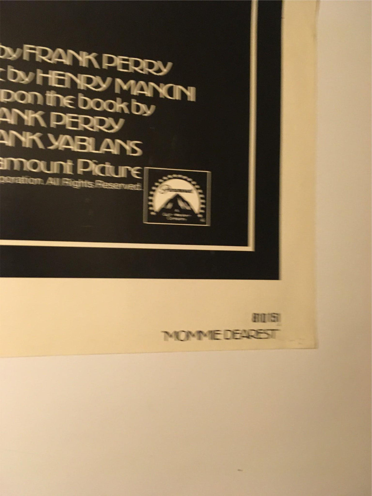 1981 Mommie Dearest 41" x 27" Original Movie Poster which includes the signature of Faye Dunaway as Joan Crawford, featuring detailed credits and vintage design elements, essential for movie memorabilia enthusiasts.