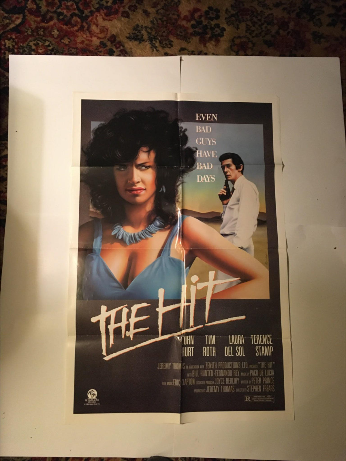 1984 The Hit 41" x 27" Original Movie Poster featuring John Hurt and Terence Stamp in dramatic poses, capturing the essence of the film.