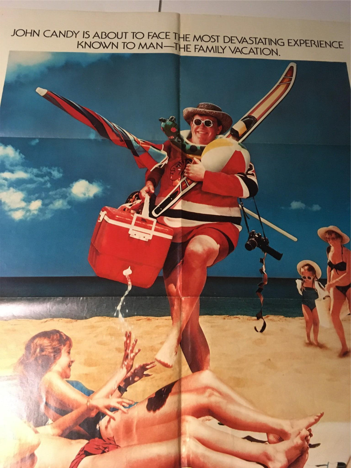 1985 Summer Rental 41" x 27" Original Movie Poster portraying John Candy dressed for the beach with accessories, illustrating a humorous vacation atmosphere.