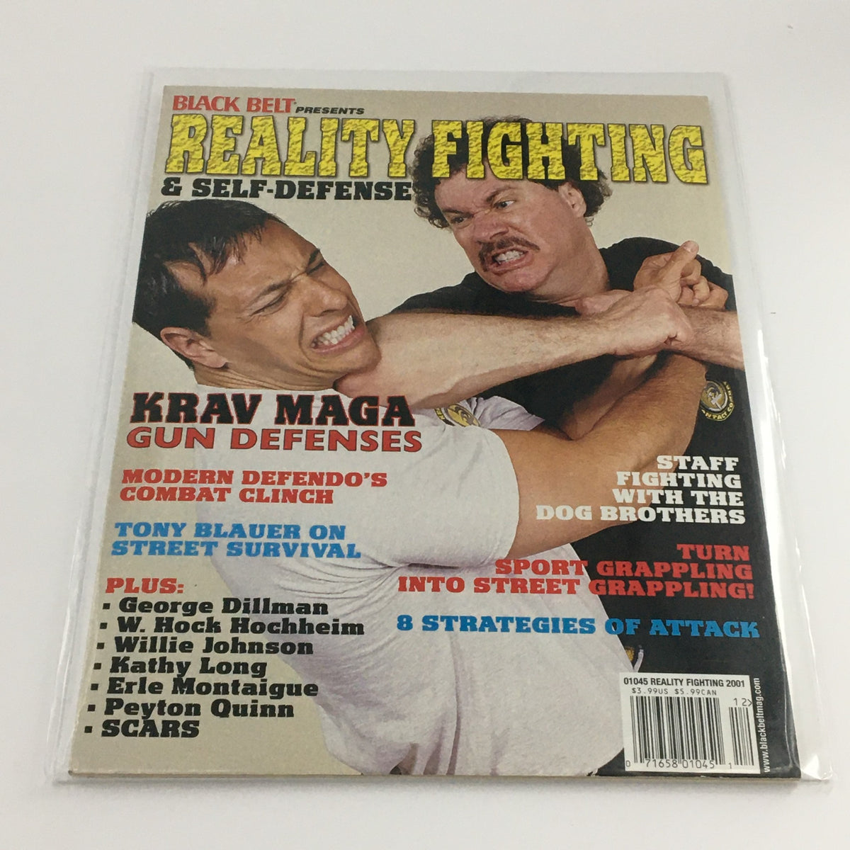 Reality Fighting Magazine 2001 featuring Tony Bleaur, showcasing Krav Maga gun defenses and strategies for street survival, with action-oriented cover art.