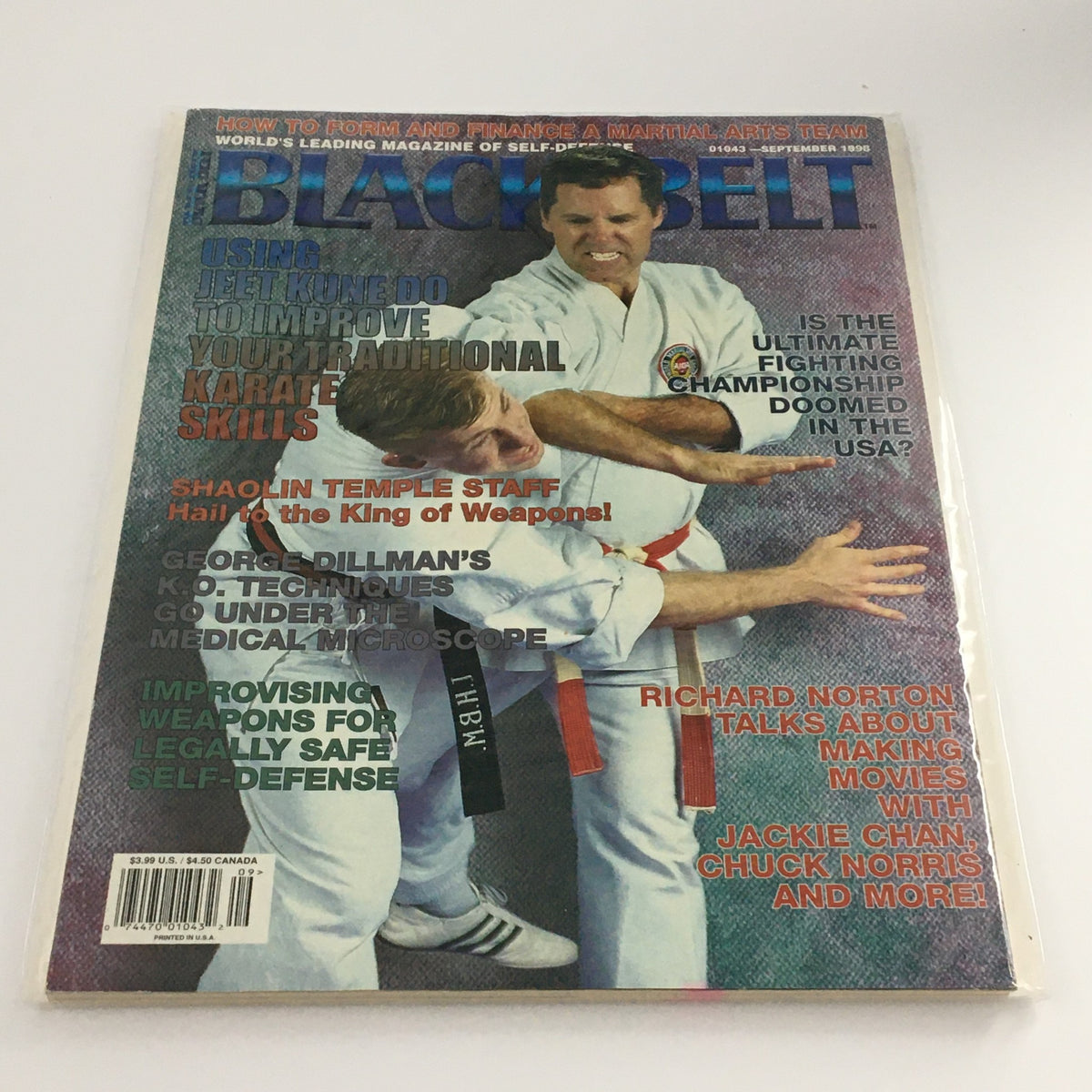 Black Belt Magazine September 1998 featuring George Dillman's K.O. Techniques. The cover showcases martial artists demonstrating techniques with bold headlines about improving skills, Shaolin staff, and interviews.