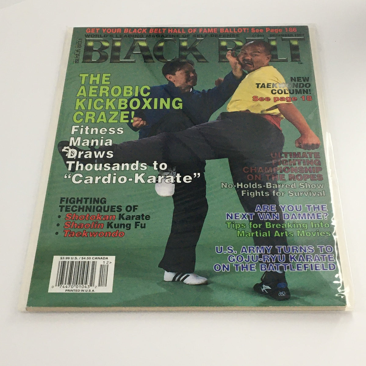 Cover of Black Belt Magazine December 1997 showcasing the Fighting Techniques of Shotokan Karate, featuring two martial artists practicing moves. Highlights include articles on aerobic kickboxing, Shaolin Kung Fu, Taekwondo, and tips for martial arts enthusiasts.