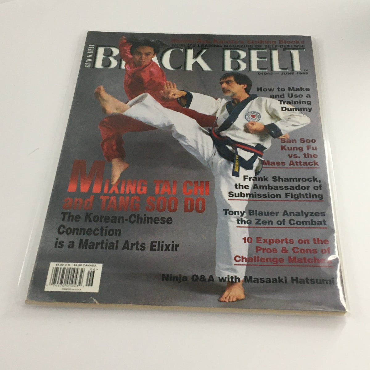Cover of Black Belt Magazine June 1998 featuring the article on Mixing Tai Chi and Tang Soo Do. The image shows two martial artists in action, one in a red outfit and the other in a white uniform with black belt, highlighting martial arts techniques.