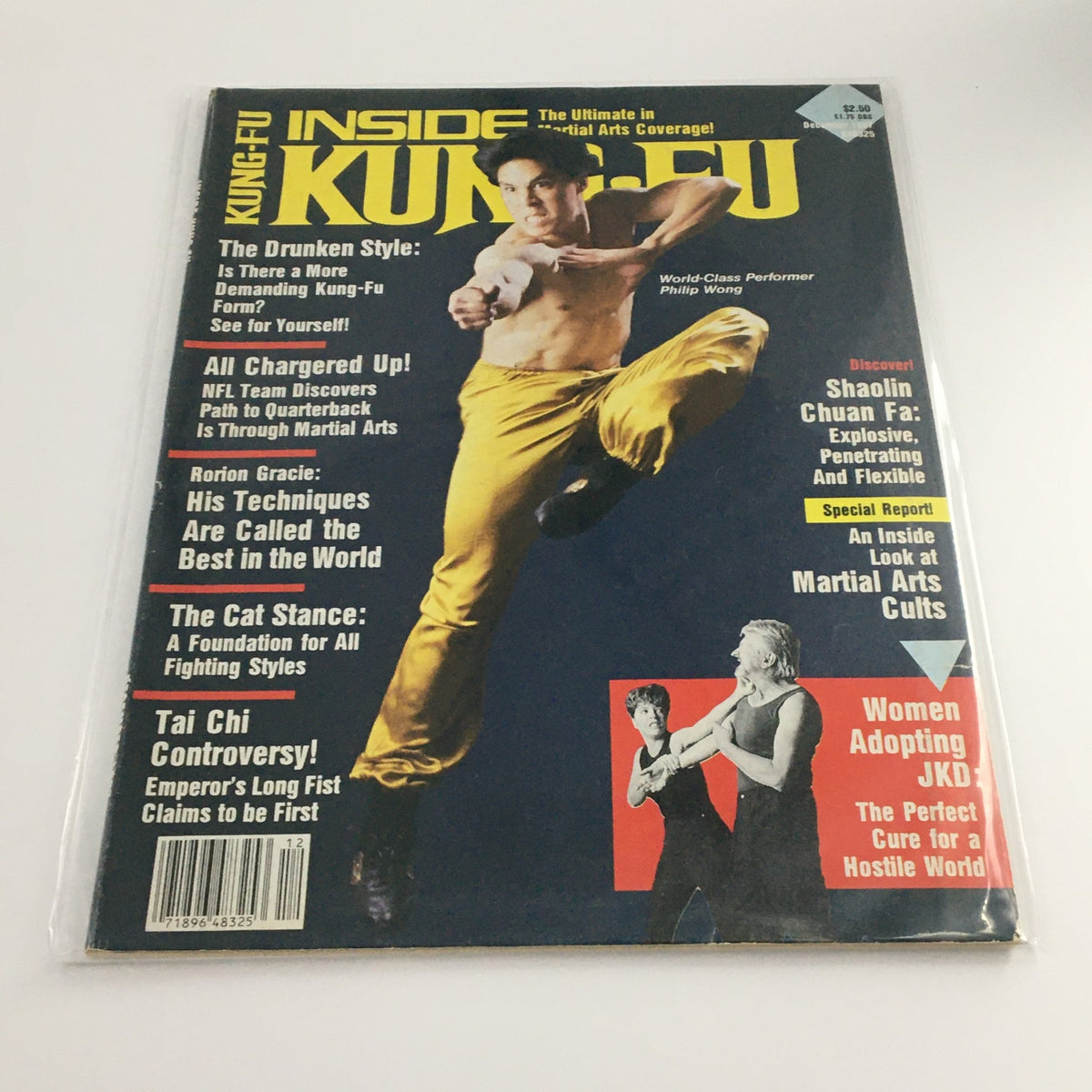 Inside KungFu Magazine from December 1999 featuring World Class Performer Philip Wong on the cover, showcasing martial arts techniques and articles.