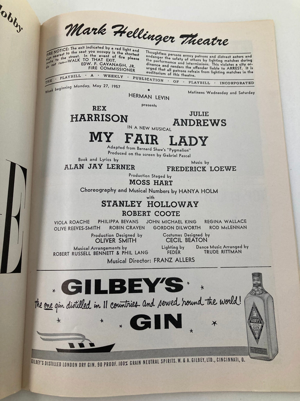 Interior page of the 1957 Playbill for My Fair Lady at the Mark Hellinger Theatre, listing cast and production details, including Rex Harrison and Julie Andrews.