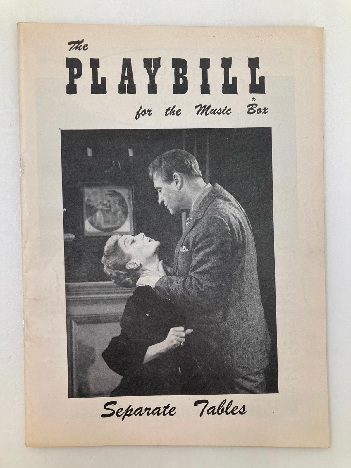 1957 Playbill for The Music Box featuring the play Separate Tables, showcasing a black and white image of two characters in a dramatic pose.