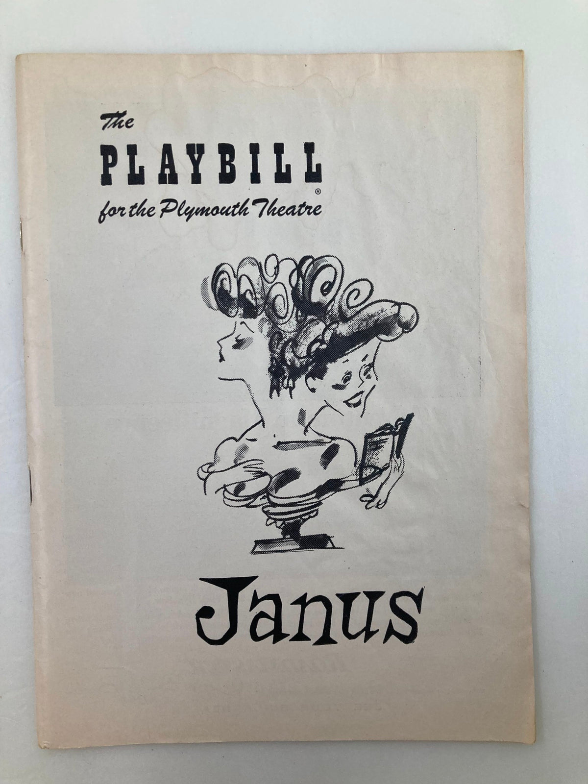 1956 Playbill for The Plymouth Theatre featuring the play Janus, showcasing artistic illustration of characters on the cover.