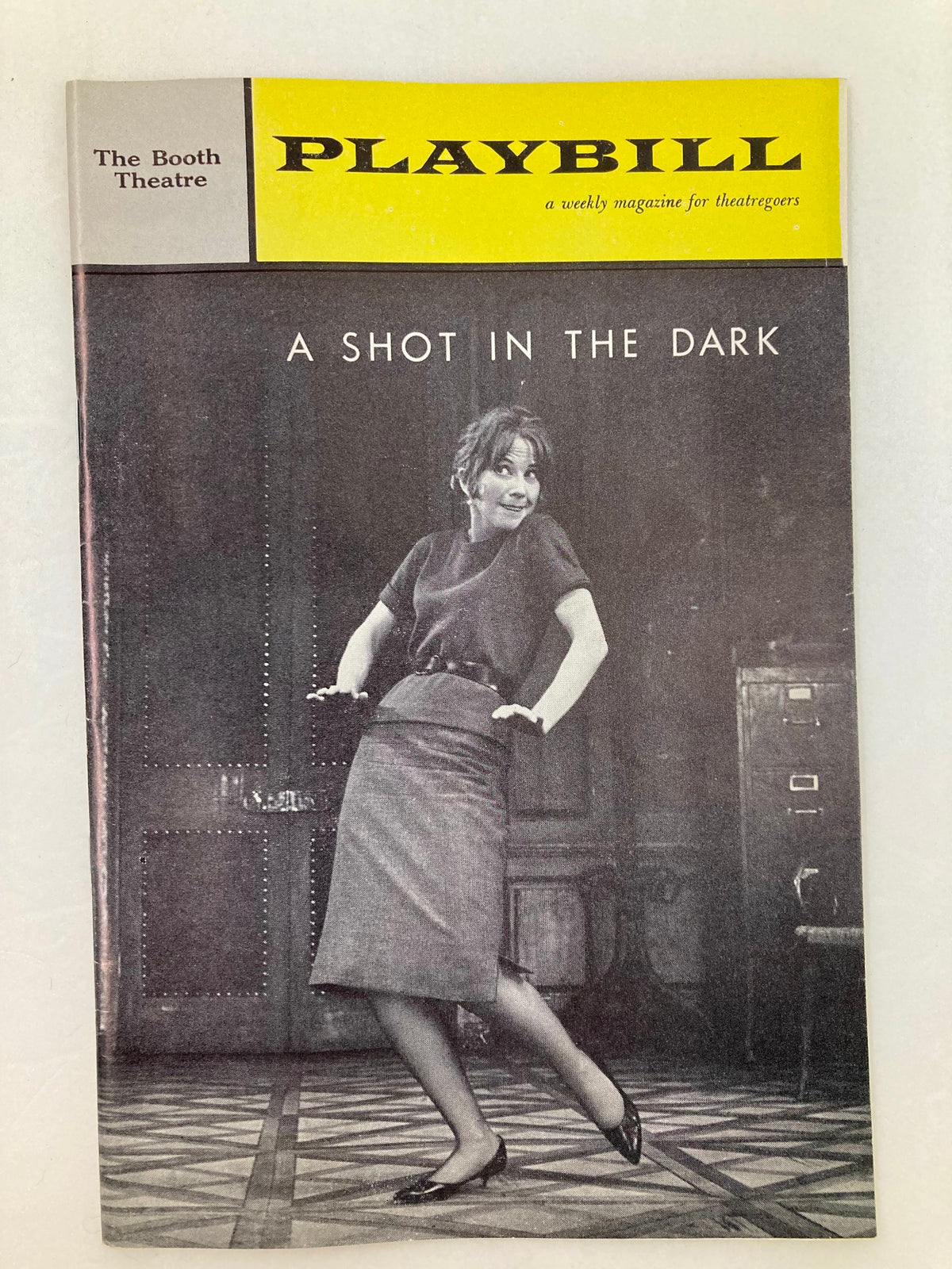 1962 Playbill featuring Julie Harris in 'A Shot In The Dark' at The Booth Theatre, showcasing the cover design and vintage aesthetic.