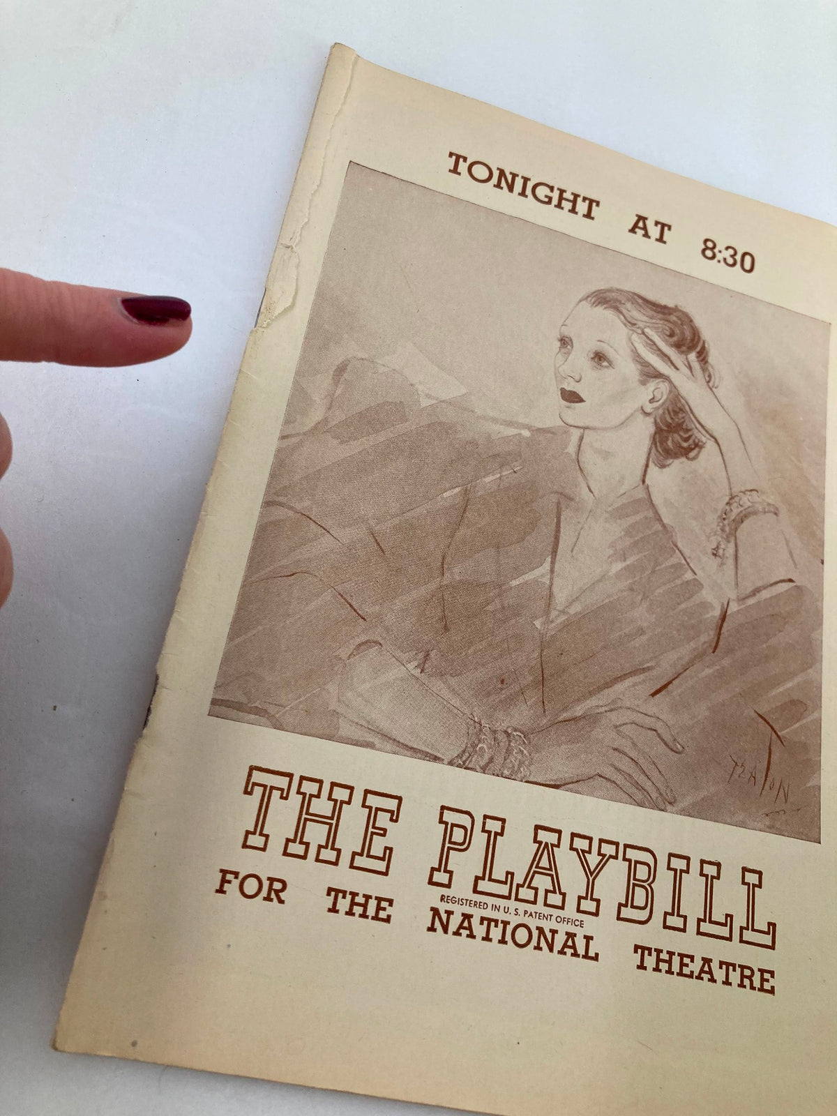Close-up of the 1948 Playbill for the National Theatre, highlighting Gertrude Lawrence in Tonight at 8:30, with visible creasing on the edge.