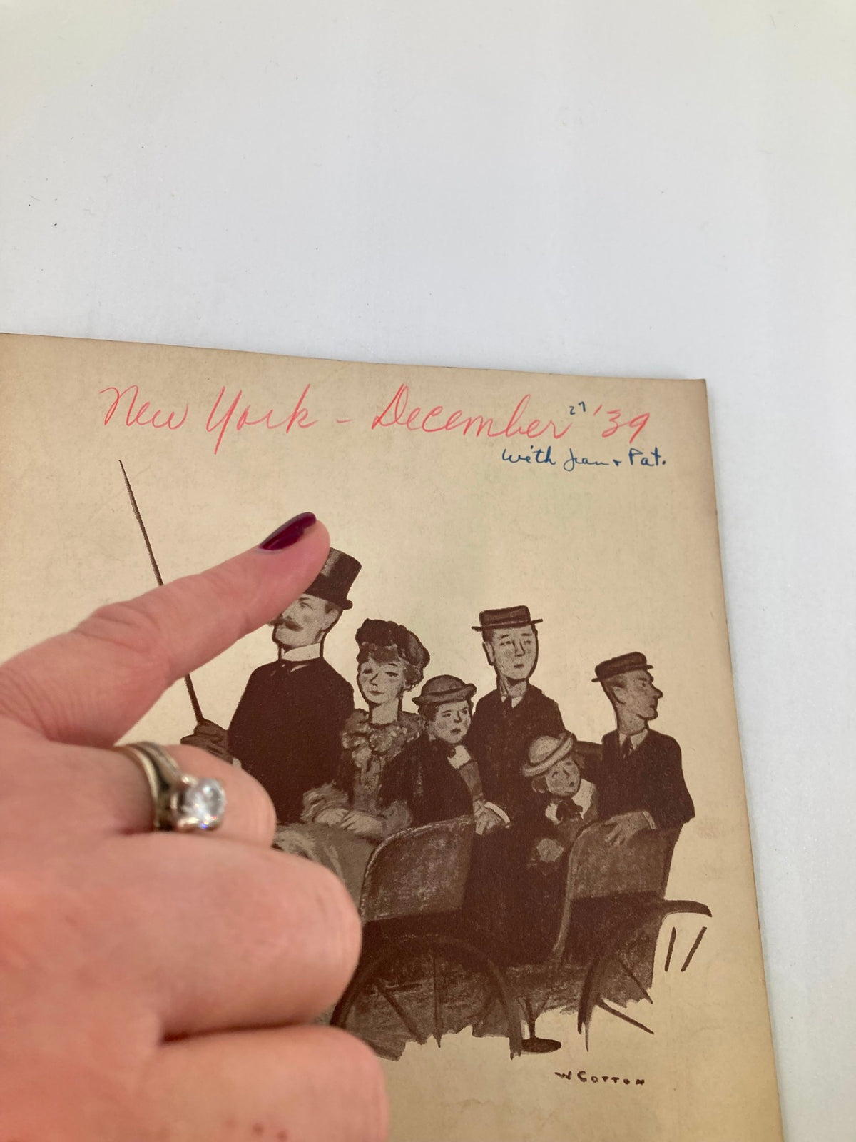Close-up of the 1939 Playbill for The Empire Theatre, highlighting handwritten notes dated December 21, 1939, with personal inscriptions. The cover art features characters in a carriage.