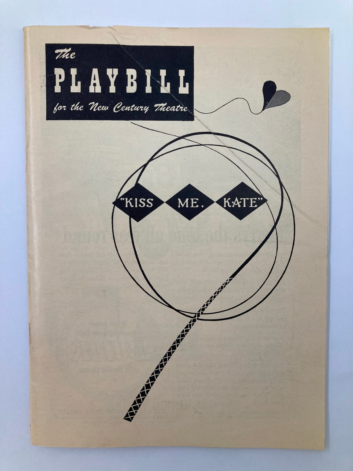 1949 Playbill for the New Century Theatre featuring the title 'Kiss Me, Kate' with stylized design elements and a decorative heart.