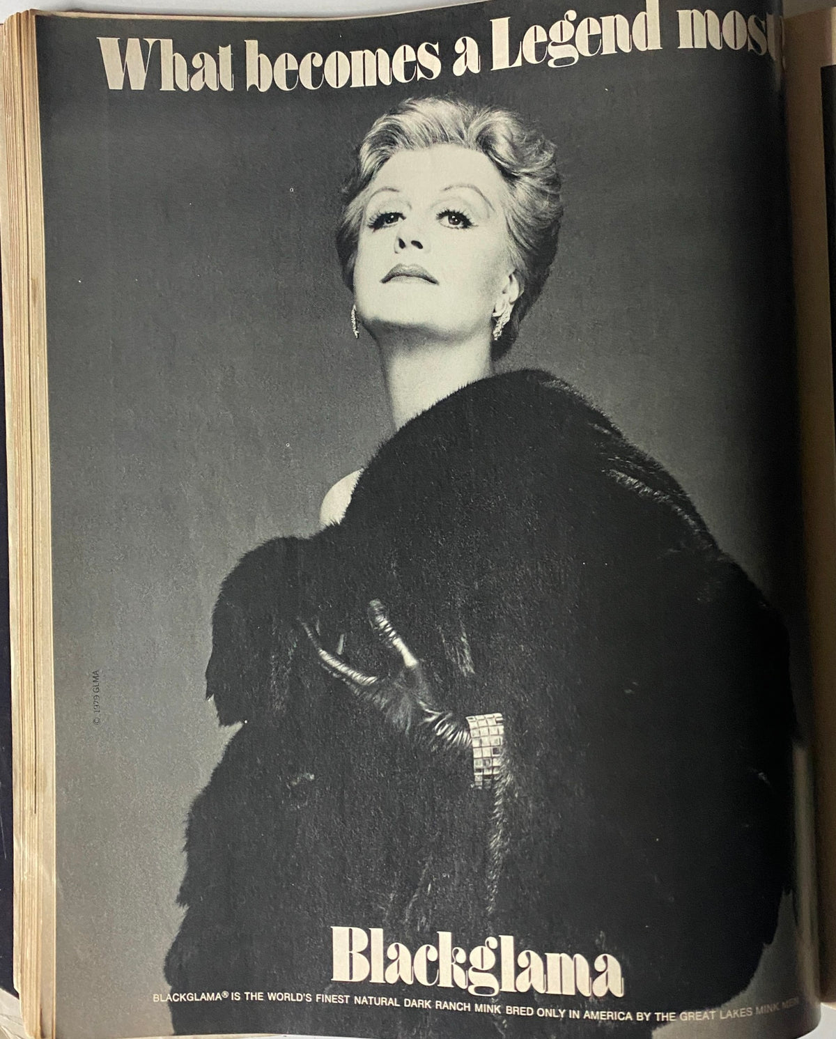 Black and white advertisement from Harper's Bazaar Magazine September 1979 showcasing luxurious fur fashion with elegant model pose and bold text reading 'What becomes a Legend most?'.