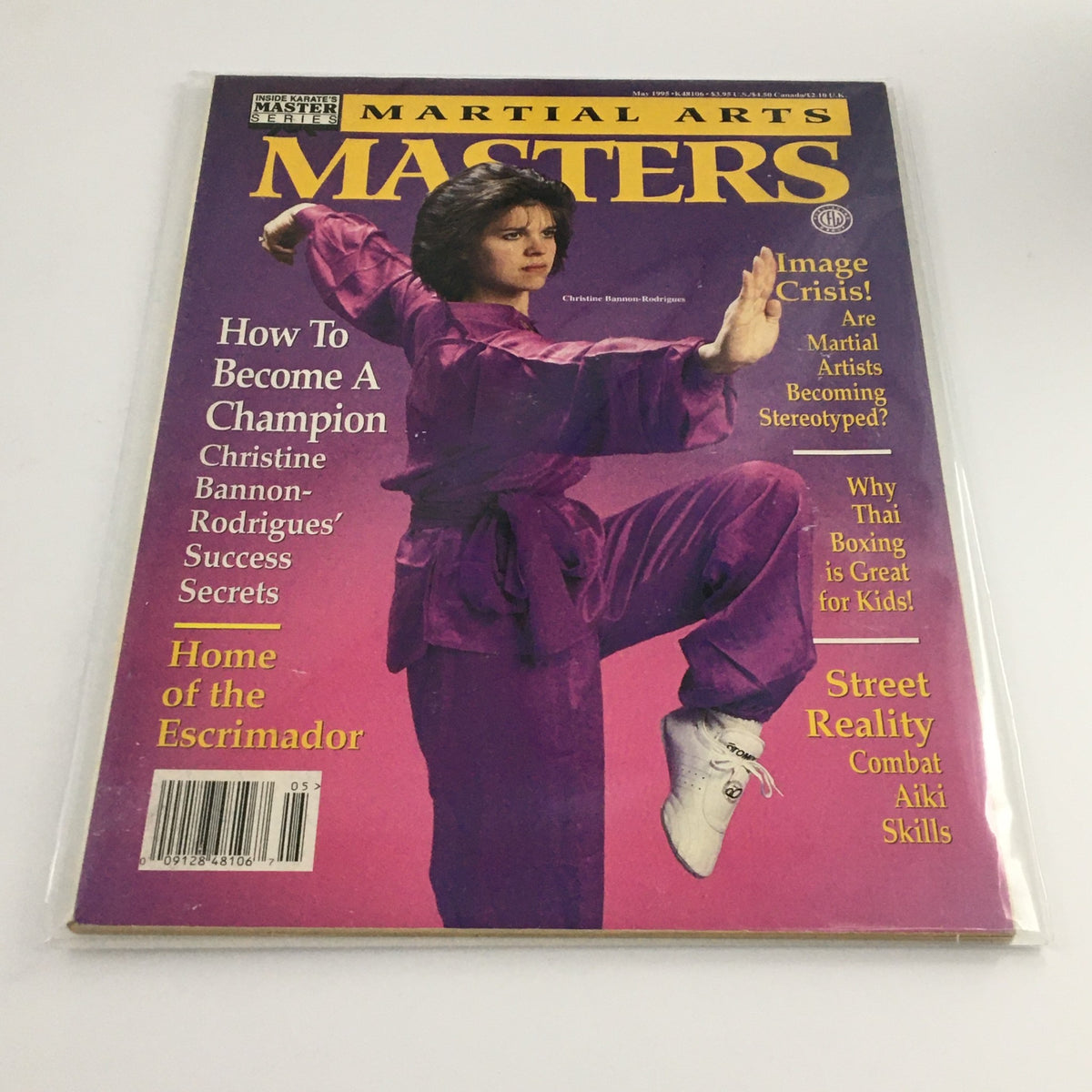 Cover of Martial Arts Masters May 1995 featuring Christine Bannon-Rodrigues in a martial arts pose, highlighting her success and insights on becoming a champion.
