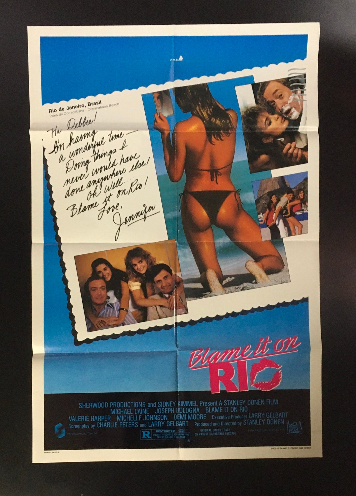 1984 Blame it on Rio 41" x 27" Original Movie Poster featuring scenes from the film with a focus on a woman in a bikini and iconic images from the movie.