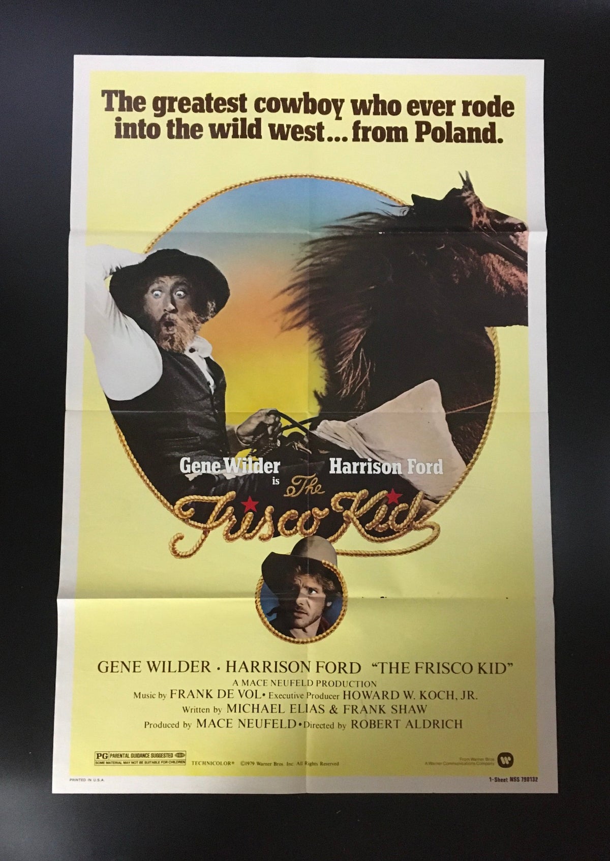 1979 The Frisco Kid 41" x 27" Original Movie Poster featuring Gene Wilder and Harrison Ford. The poster showcases vibrant colors and classic typography, highlighting the tagline 'The greatest cowboy who ever rode into the wild west... from Poland.'