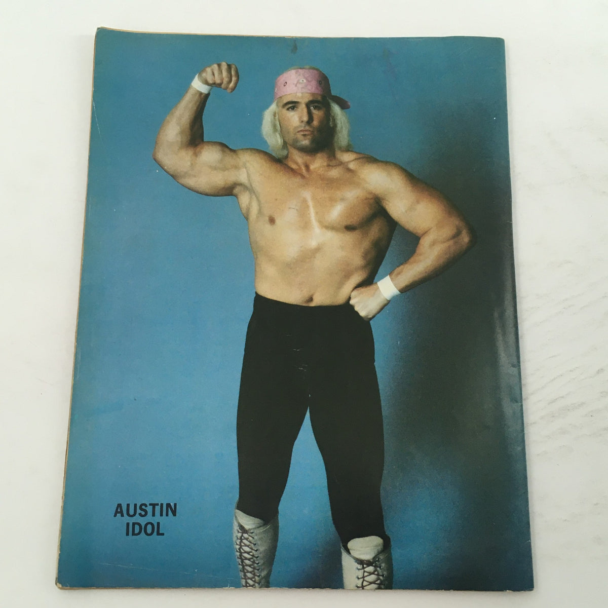 Austin Idol featured on the cover of Wrestling Magazine #71, 1981, showcasing the wrestling star in a dramatic pose against a blue background.