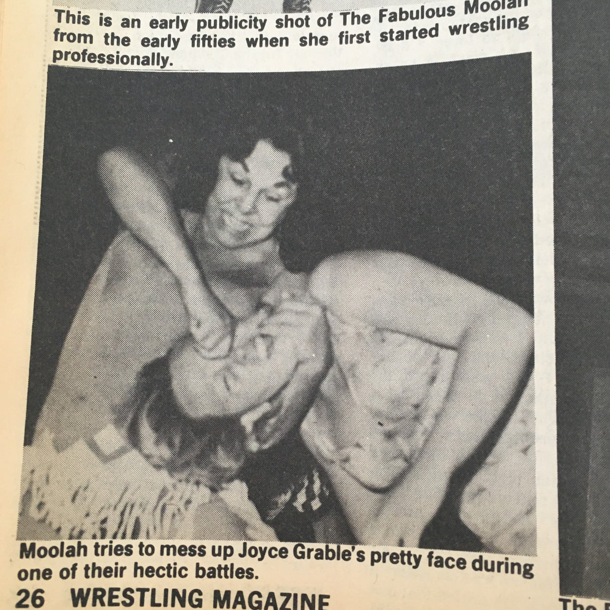 An early publicity shot of The Fabulous Moolah featured in The Ring's Wrestling Magazine August 1981 issue #74, capturing a fierce moment during a wrestling match.