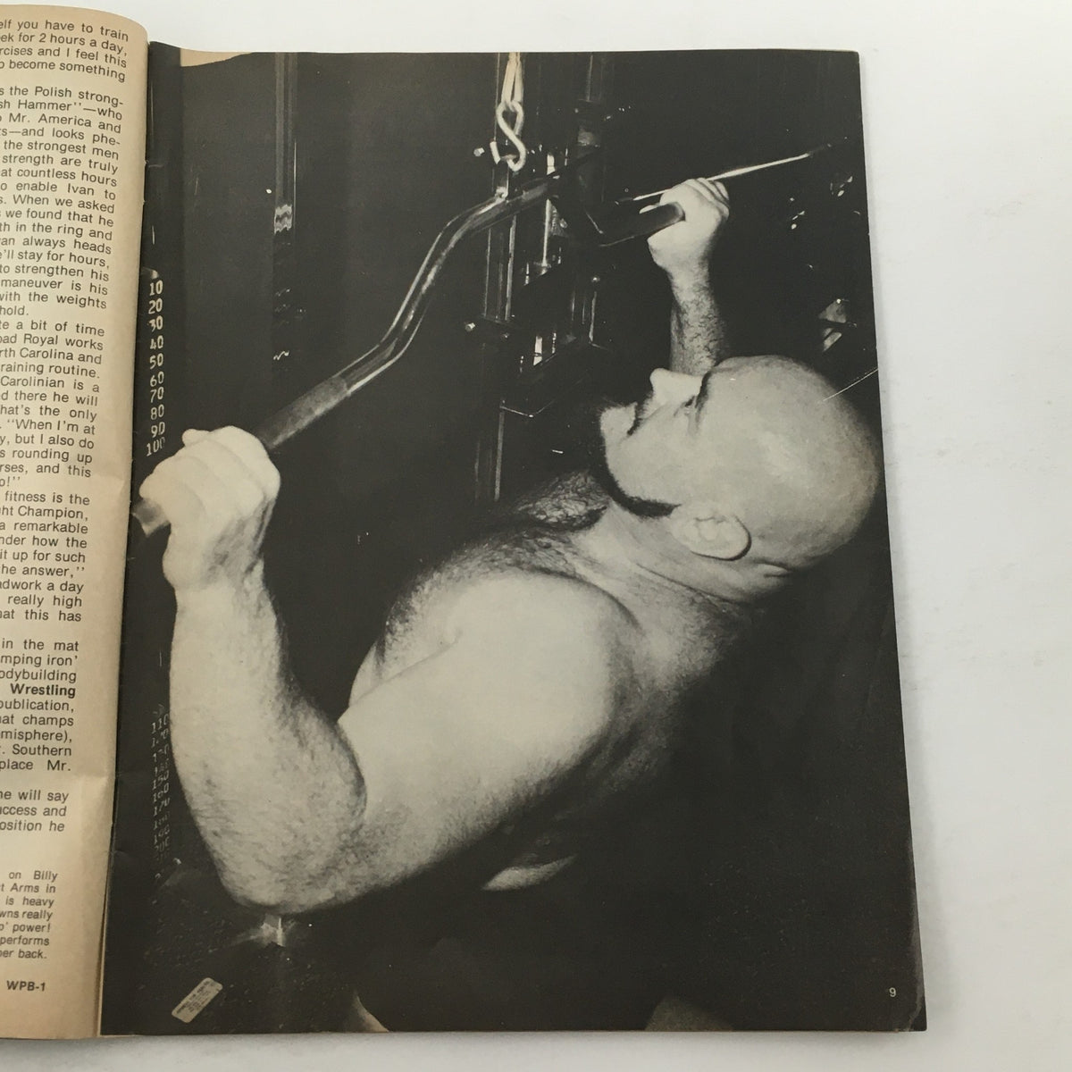 Black and white photo of an athlete using a pull-up exercise machine, featured in Wrestling Training Illustrated Magazine Spring 1980.