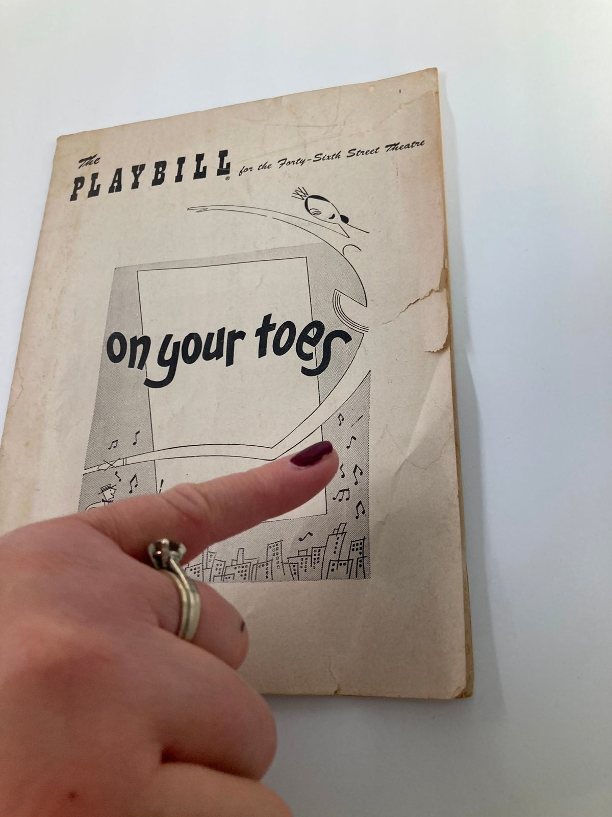 Cover of the 1954 Playbill for the Forty-Sixth Street Theatre featuring the title 'On Your Toes' with a graphic of a ballet dancer.
