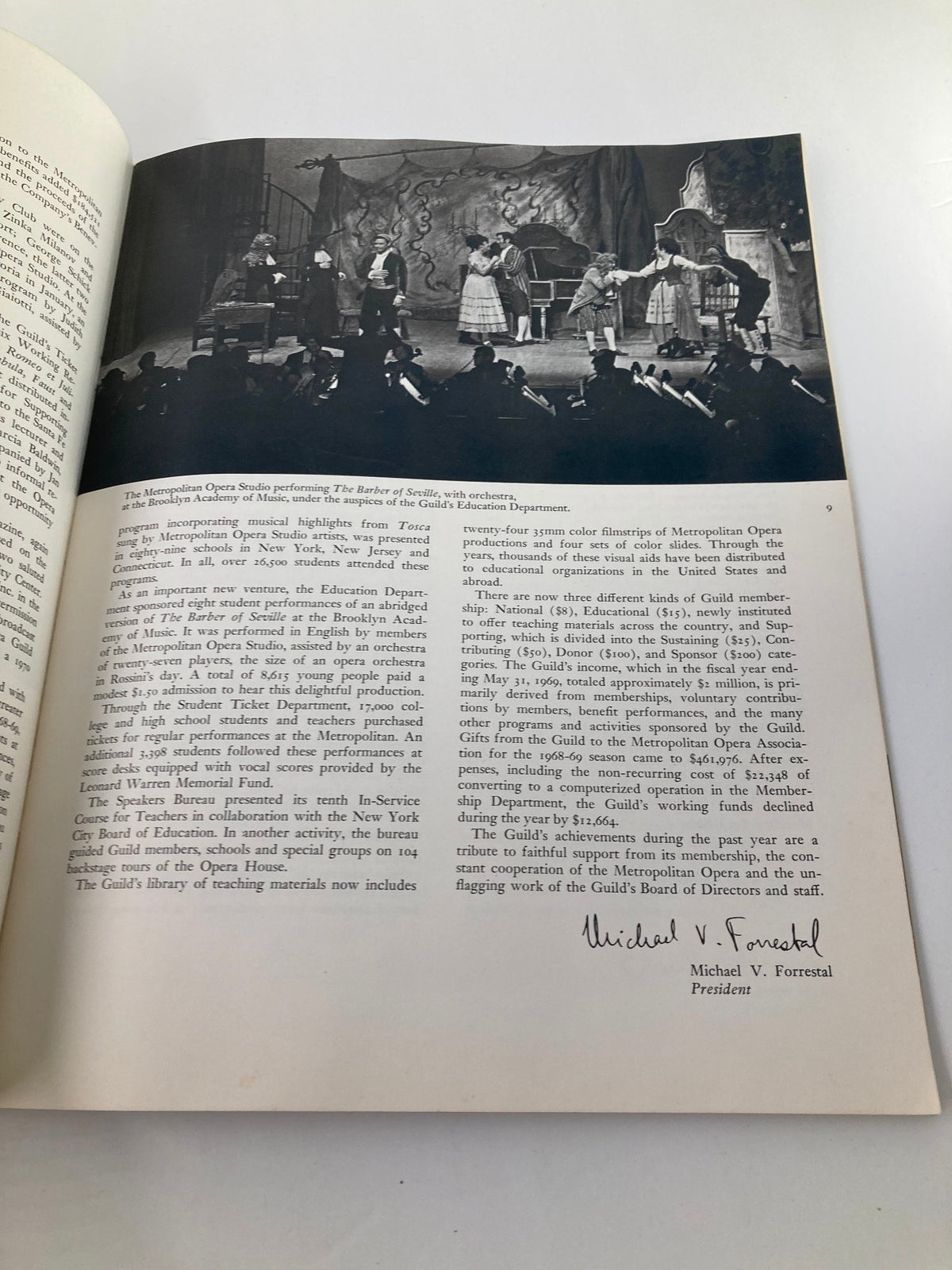 Photo from the 1968 Program Souvenir Metropolitan Opera Association Annual Report showcasing a performance of The Barber of Seville by the Metropolitan Opera Studio with actors on stage.