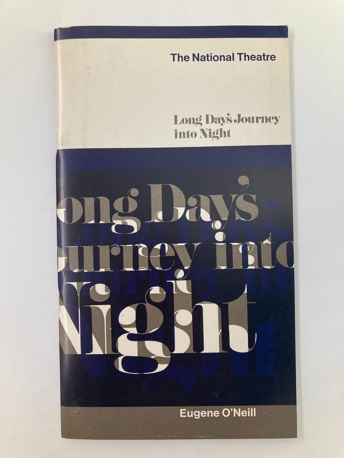 Cover of the 1963-1971 Souvenir Program for The National Theatre's 'Long Day's Journey Into Night' by Eugene O'Neill, featuring bold typography and a minimalist design.