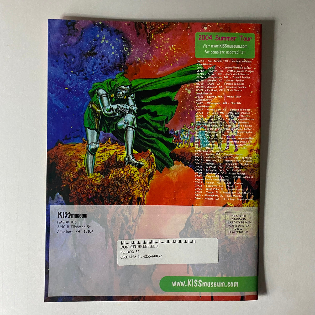 Cover of the Summer 2004 KISS Museum.com Catalog featuring a vibrant illustration related to the 2004 Summer Tour, including tour dates and locations.