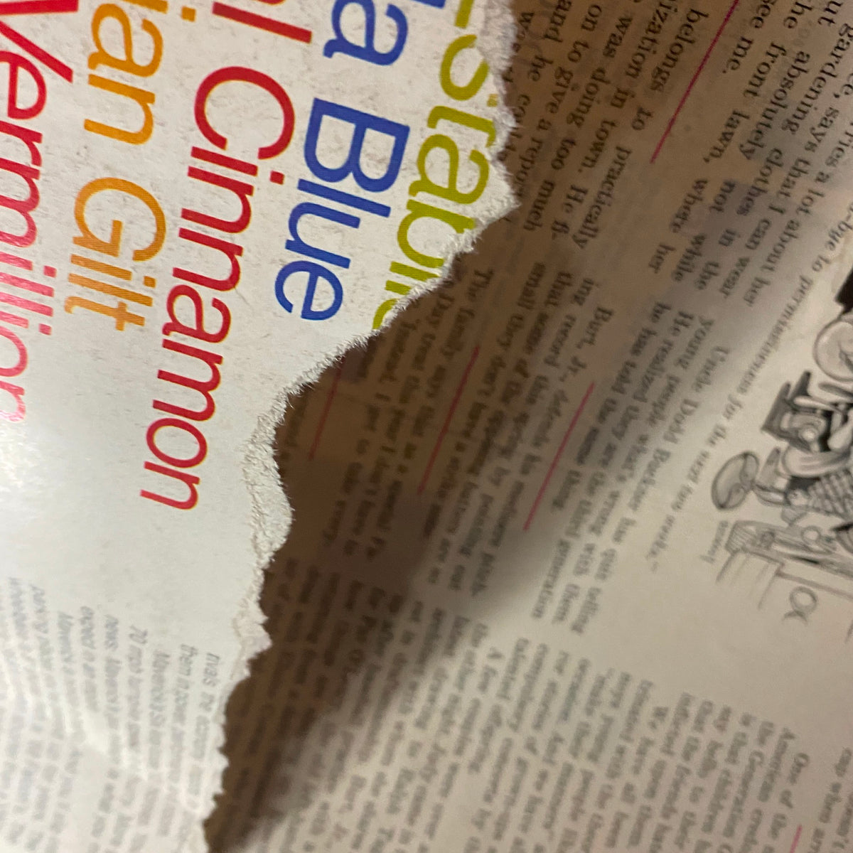 Close-up of a page from the Lot of 15 Better Homes and Gardens Magazine 1968 - 1969, 1971 illustrating colorful text and a partially torn page, emphasizing the vintage condition of the magazine.