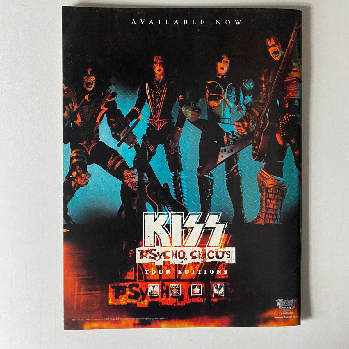 Promotional image for the KISS Psycho Circus tour with band members in iconic costumes, featured in the 1999 Todd McFarlane Presents Vol 2 Kiss Psycho Circus.