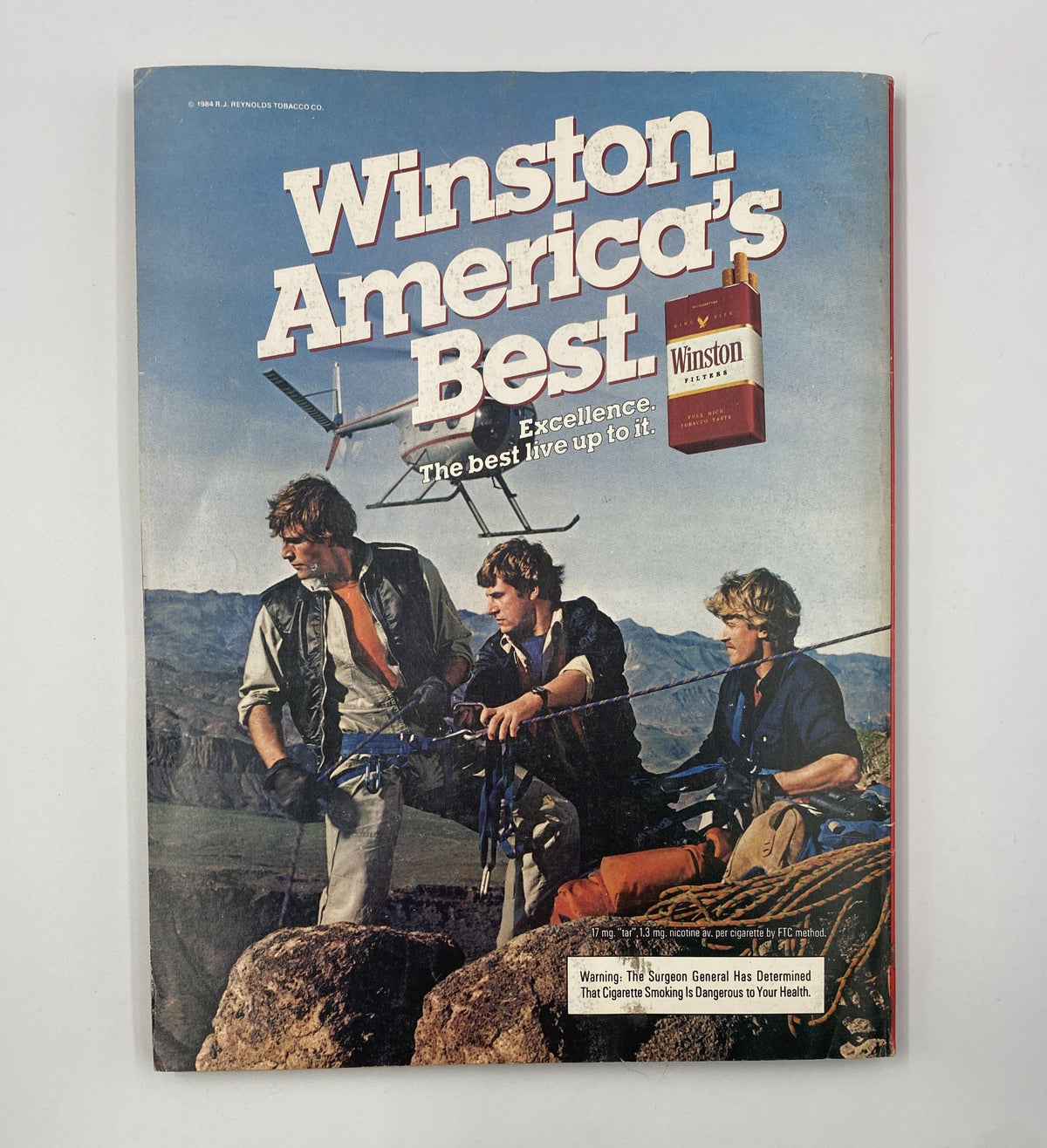 Back cover of Esquire Magazine June 1984 showcasing an advertisement for Winston cigarettes, emphasizing 'America's Best' and featuring rugged outdoor imagery.