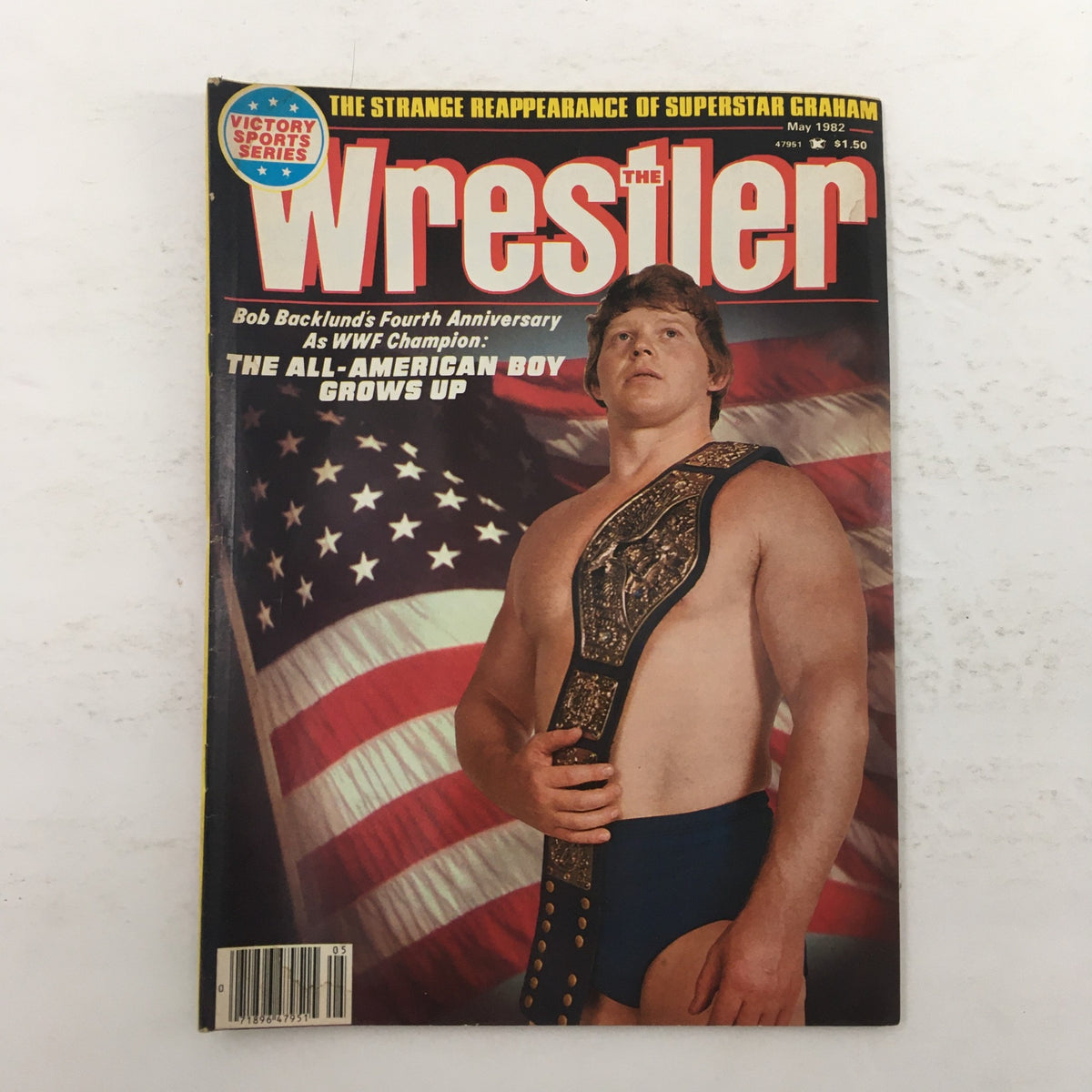 Cover of The Wrestler Magazine from May 1982, featuring WWF Champion Bob Backlund celebrating the Fourth Anniversary of the magazine. The cover showcases Backlund posing with his championship belt against a background of the American flag.