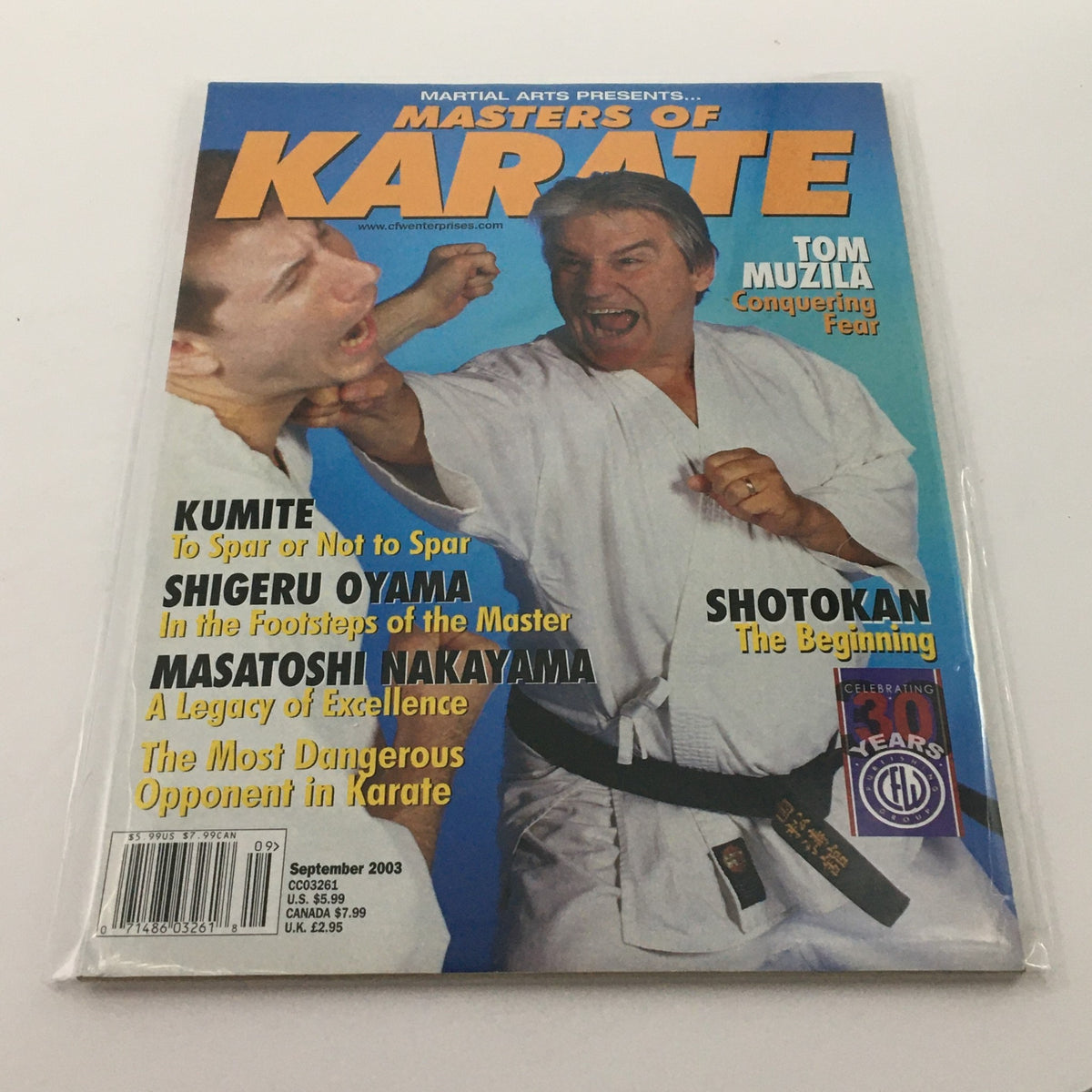 Cover image of the magazine 'Martial Arts Masters of Karate September 2003 Tom Muzila Feature, Newsstand' showcasing a karateka demonstrating an aggressive pose.