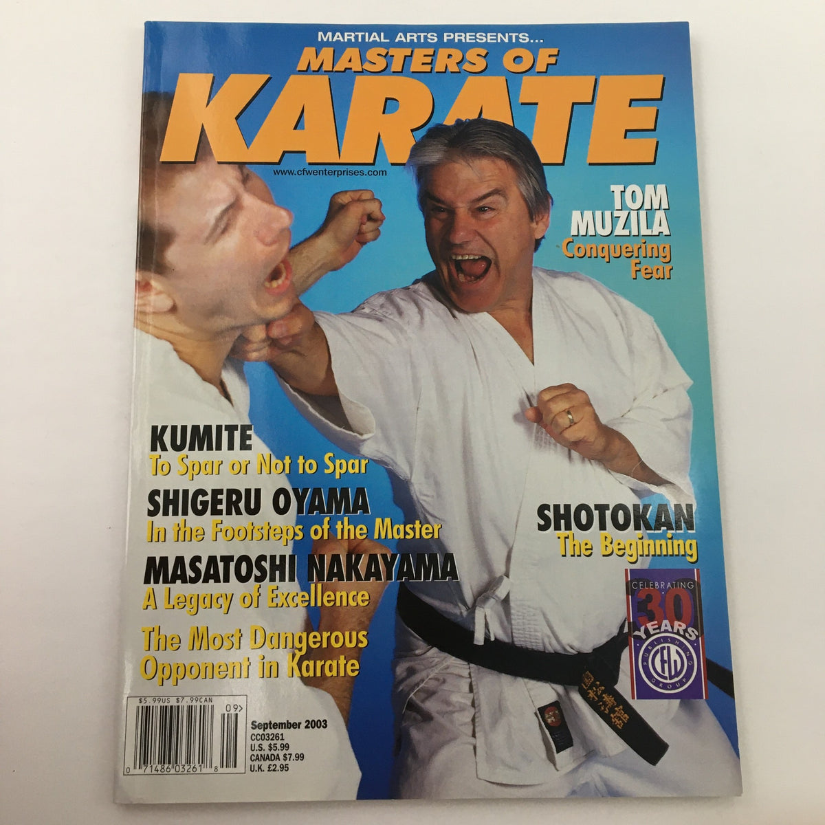 Another view of the magazine 'Martial Arts Masters of Karate September 2003 Tom Muzila Feature, Newsstand', featuring article highlights on karate techniques.