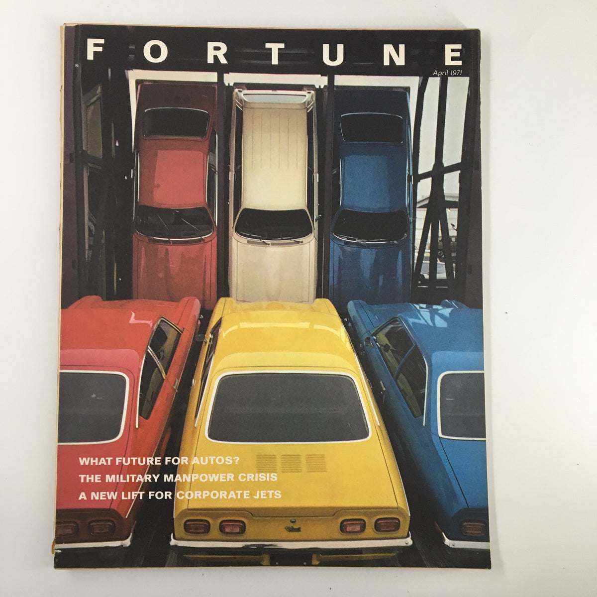 VTG Fortune Magazine April 1971 cover featuring colorful cars stacked in a parking structure with headlines about the Military Manpower Crisis and the future of the auto industry.