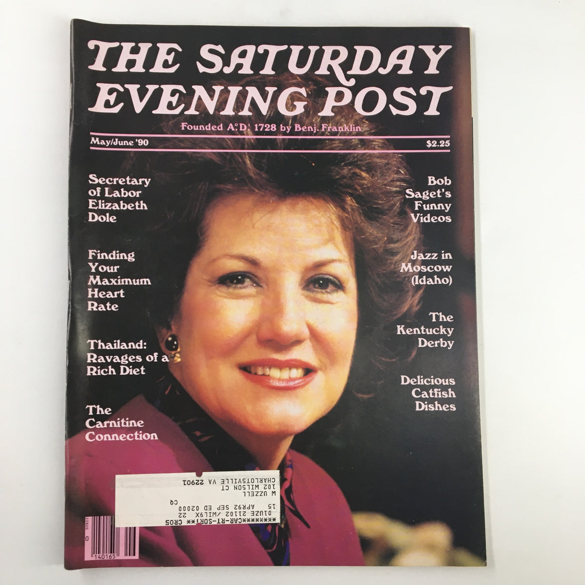 The Saturday Evening Post May 1990 featuring Secretary of Labor Elizabeth Dole on the cover. The magazine also includes articles on topics like Bob Saget's Funny Videos, Jazz in Moscow, and delicious dishes, all highlighted prominently. Condition: Very Good with a label on the front.