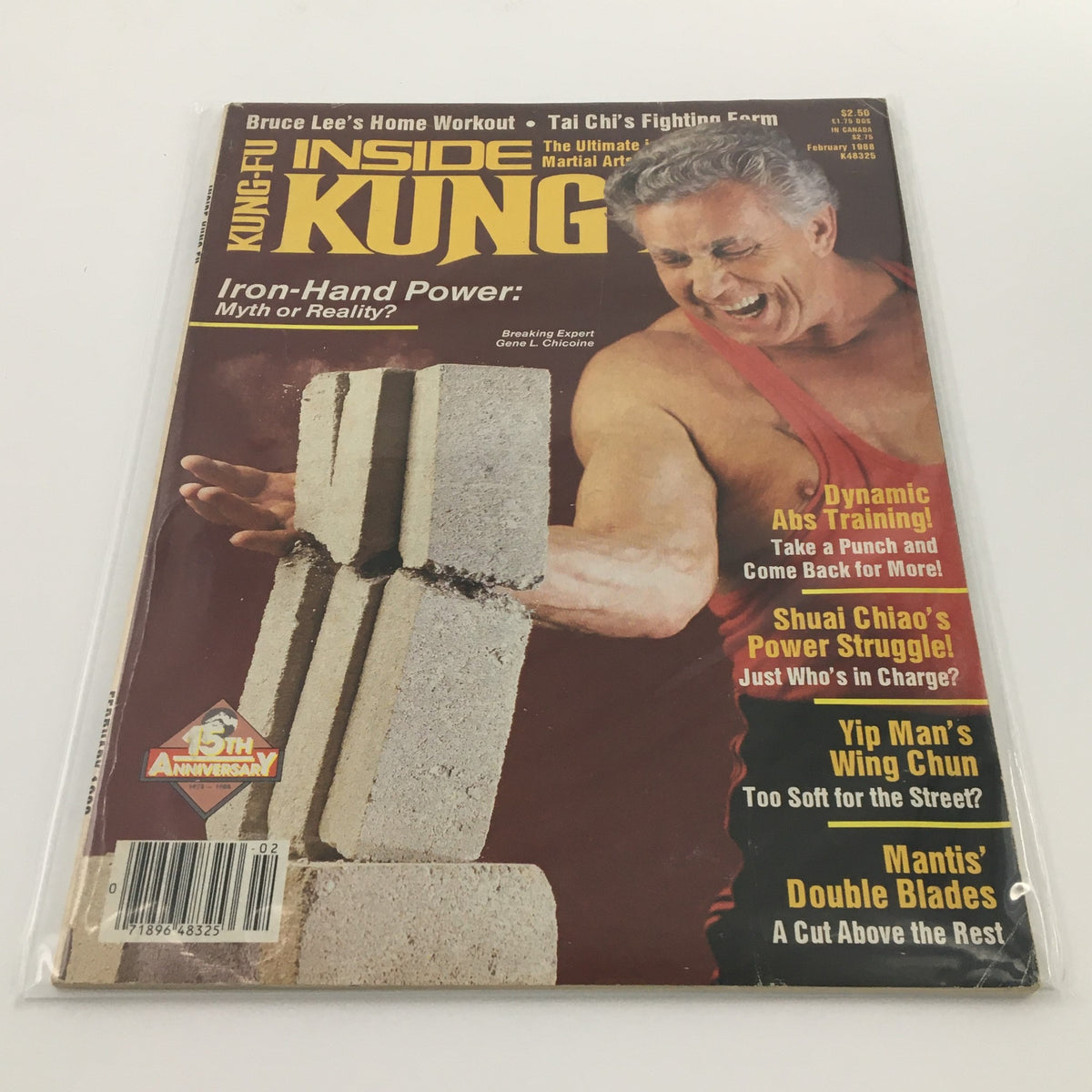 Cover of Inside Kung-Fu Magazine February 1988 featuring breaking expert Gene L. Chicoine demonstrating iron-hand power. The magazine highlights articles on dynamic abs training, Shuai Chiao, Wing Chun, and Mantis martial arts.