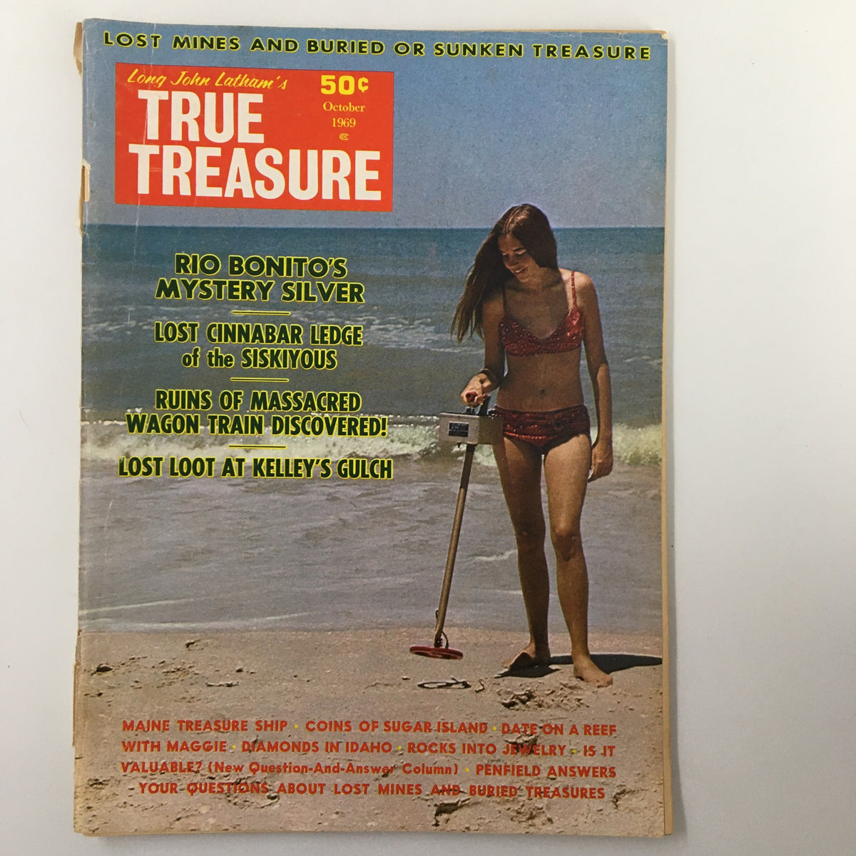 Cover of VTG True Treasure Magazine October 1969 featuring 'Rio Bonito's Mystery Silver', showcasing a woman with a metal detector on the beach.