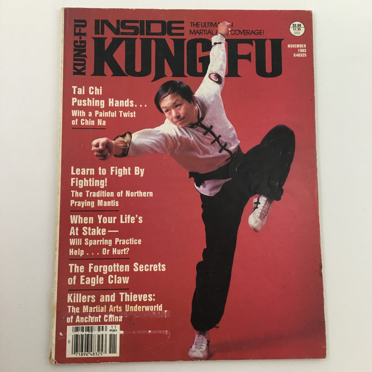 Cover of Inside Kung-Fu Magazine November 1983 featuring Tai Chi with a Painful Twist of Chin Na, showcasing martial arts techniques and articles.