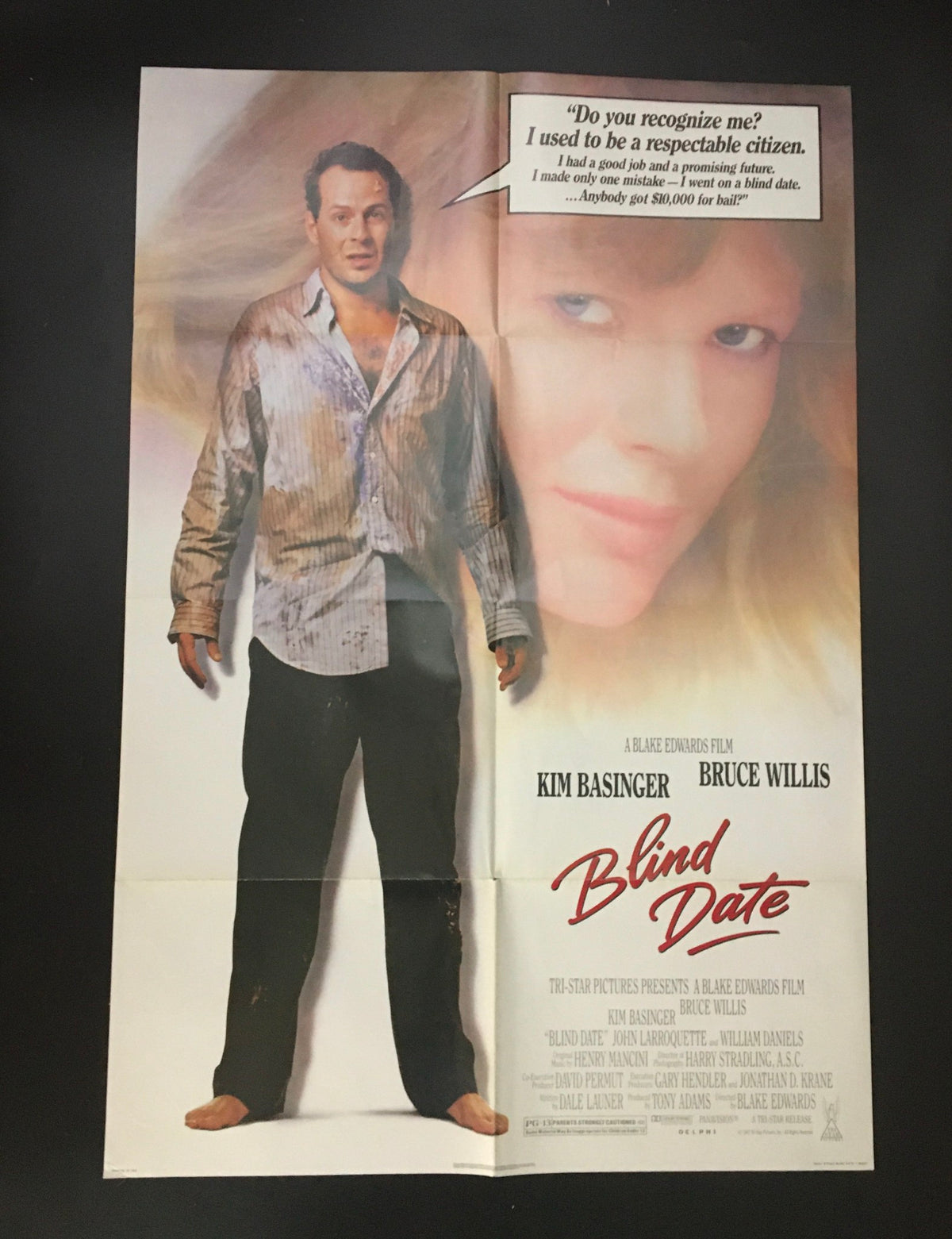 1987 Blind Date 40" x 27" Original Movie Poster featuring Bruce Willis and Kim Basinger, showcasing a dramatic scene with Bruce Willis in a disheveled shirt and a quote about recognition.