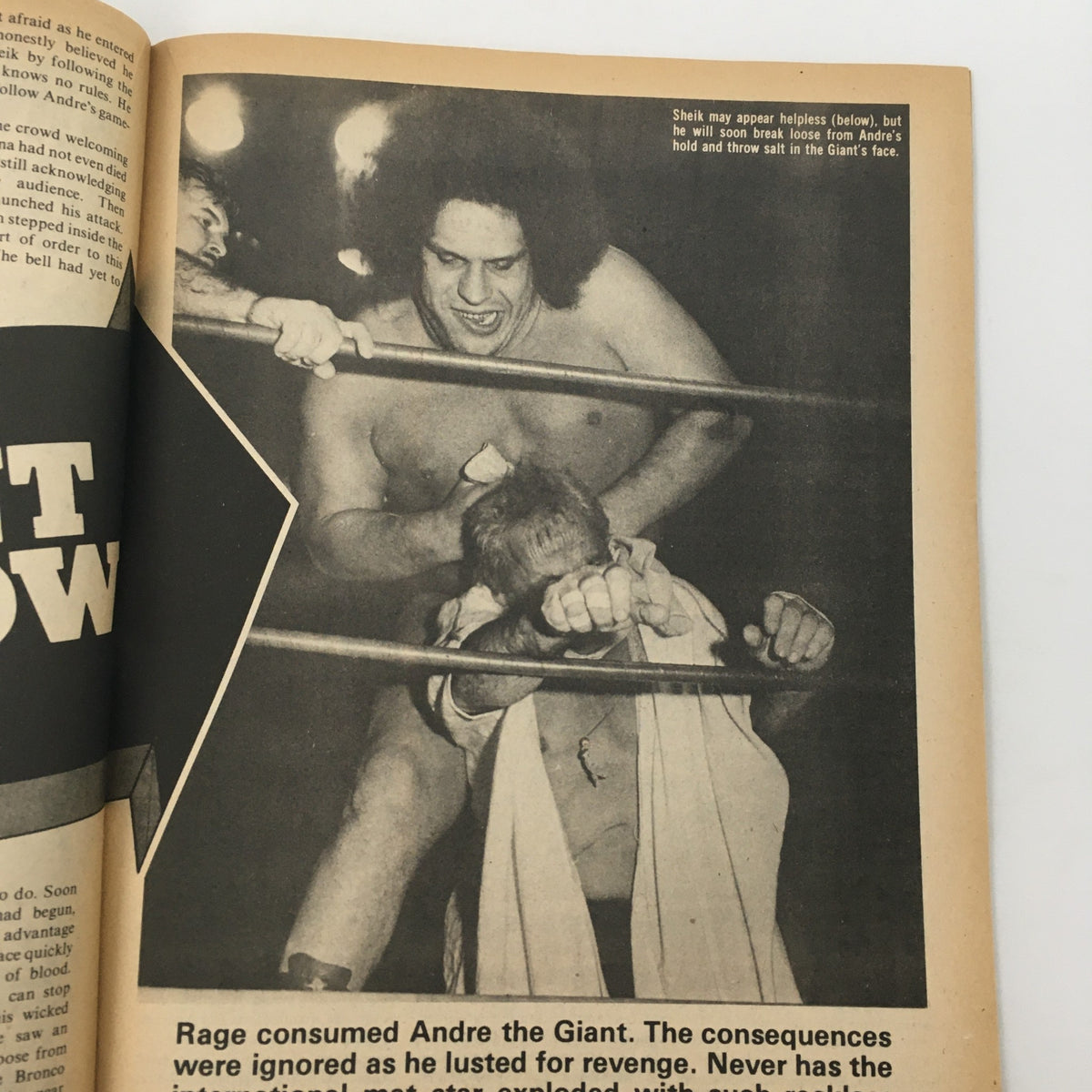 Interior page of The Wrestler Magazine June 1977 displaying an action shot of Andre the Giant in a wrestling match against The Sheik.