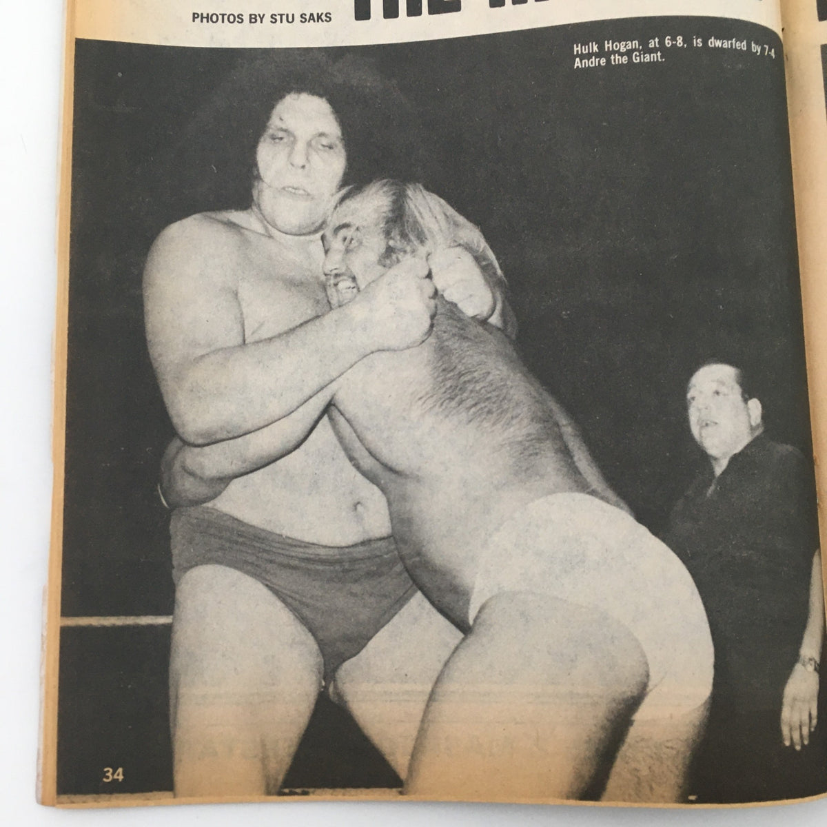 Page 34 of Sports Review Wrestling Magazine Spring 1981 depicting a wrestling match between Hulk Hogan and Andre the Giant, highlighting their size contrast and wrestling dynamics.