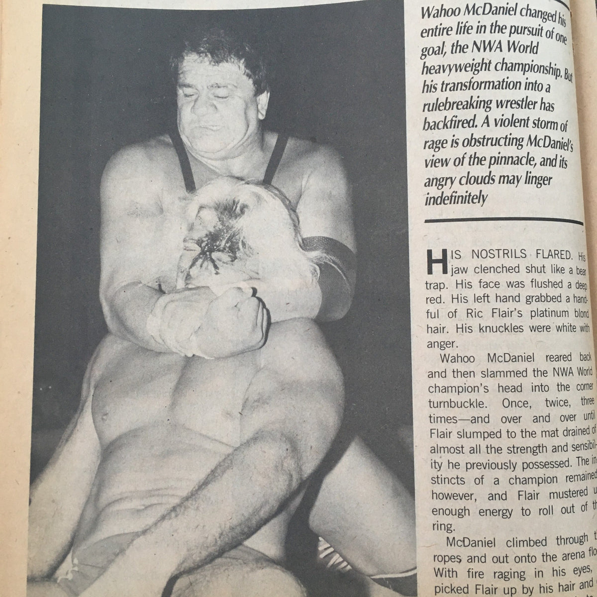 Action shot of Wahoo McDaniel grappling with Ric Flair in Sports Review Wrestling Magazine January 1985, highlighting a pivotal moment in their rivalry.