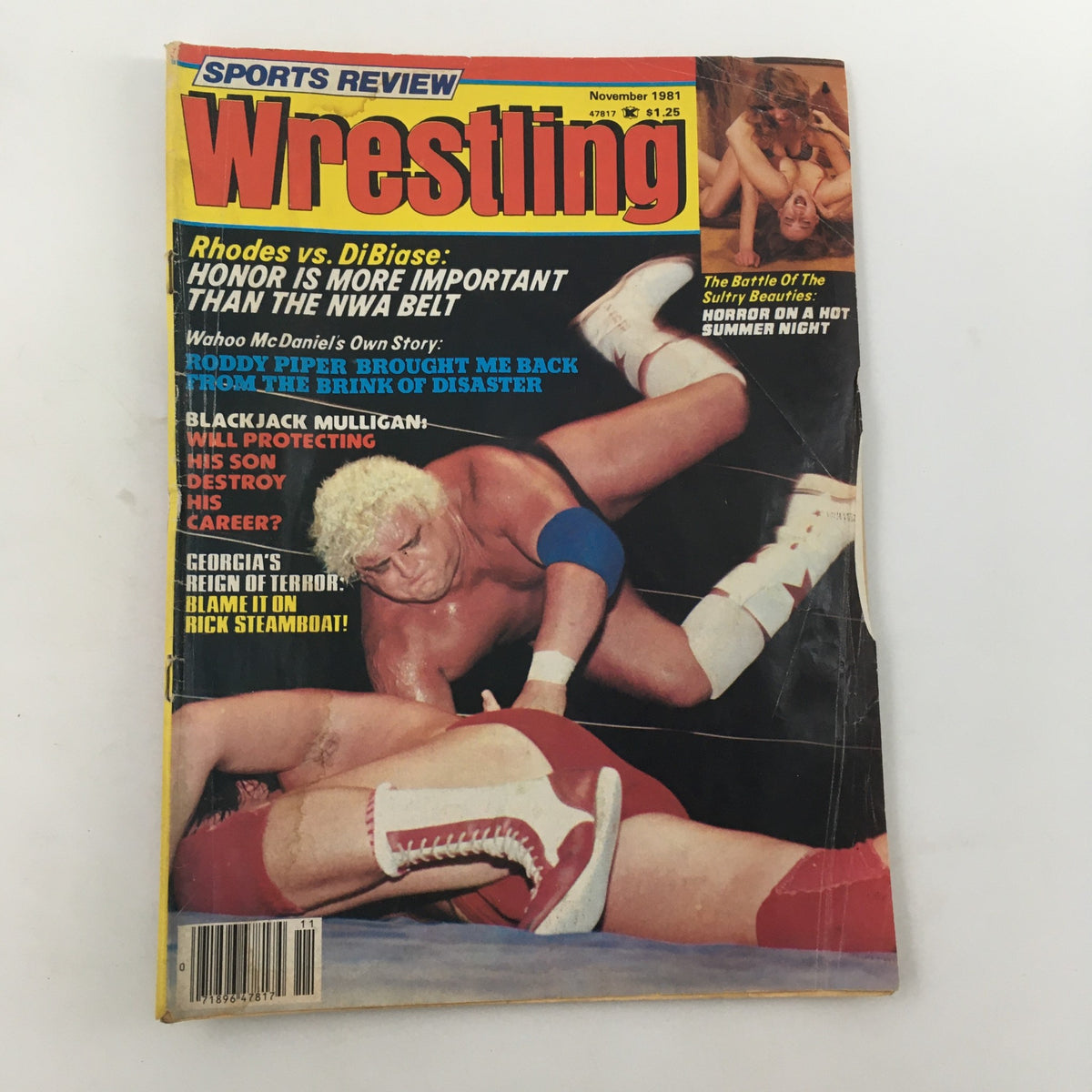 Sports Review Wrestling Magazine November 1981 showcasing Blackjack Mulligan protecting his son on the cover with various headlines and wrestlers featured.