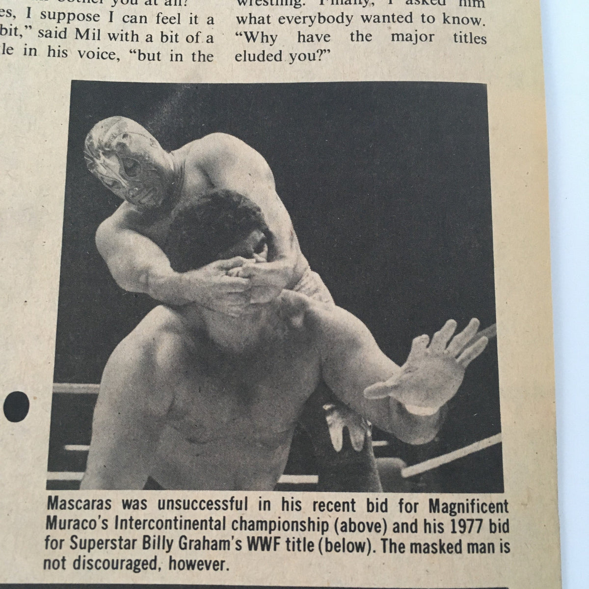 Image from Sports Review Wrestling Magazine February 1982 showing a wrestling match with a masked wrestler and his opponent, highlighting the dynamic action typical of the era.